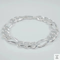 Silver bracelet on a light grey background
