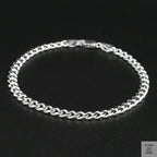 Silver bracelet on a black background