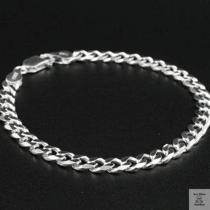 Silver bracelet on a black background