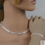 Silver curb chain necklace and bracelet on a mannequin