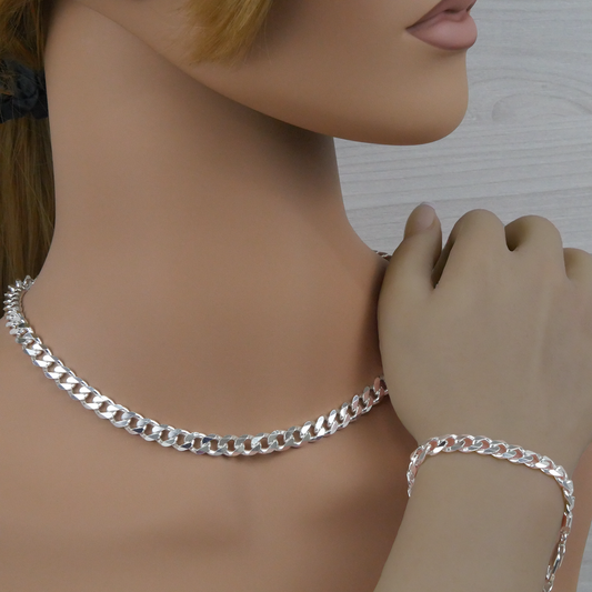Silver curb chain necklace and bracelet on a mannequin