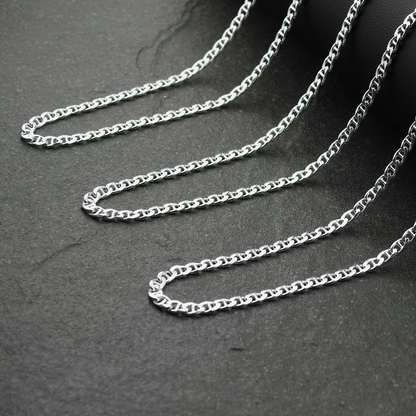 Silver chain on a dark gray background