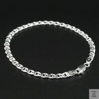 Silver chain bracelet on a black background