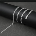 Silver marina chain on a dark surface