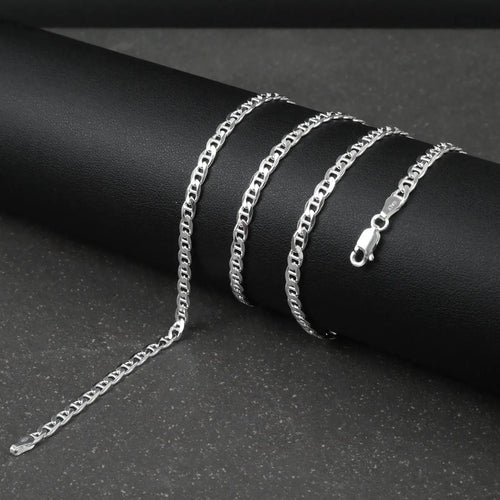 Silver marina chain on a dark surface