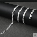 Silver marina chain on a black surface