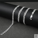 Silver marina chain on a black surface