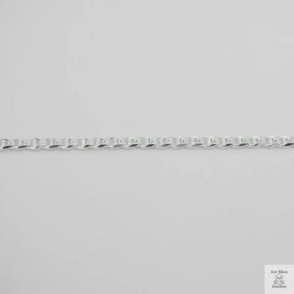 Silver chain on a light gray background