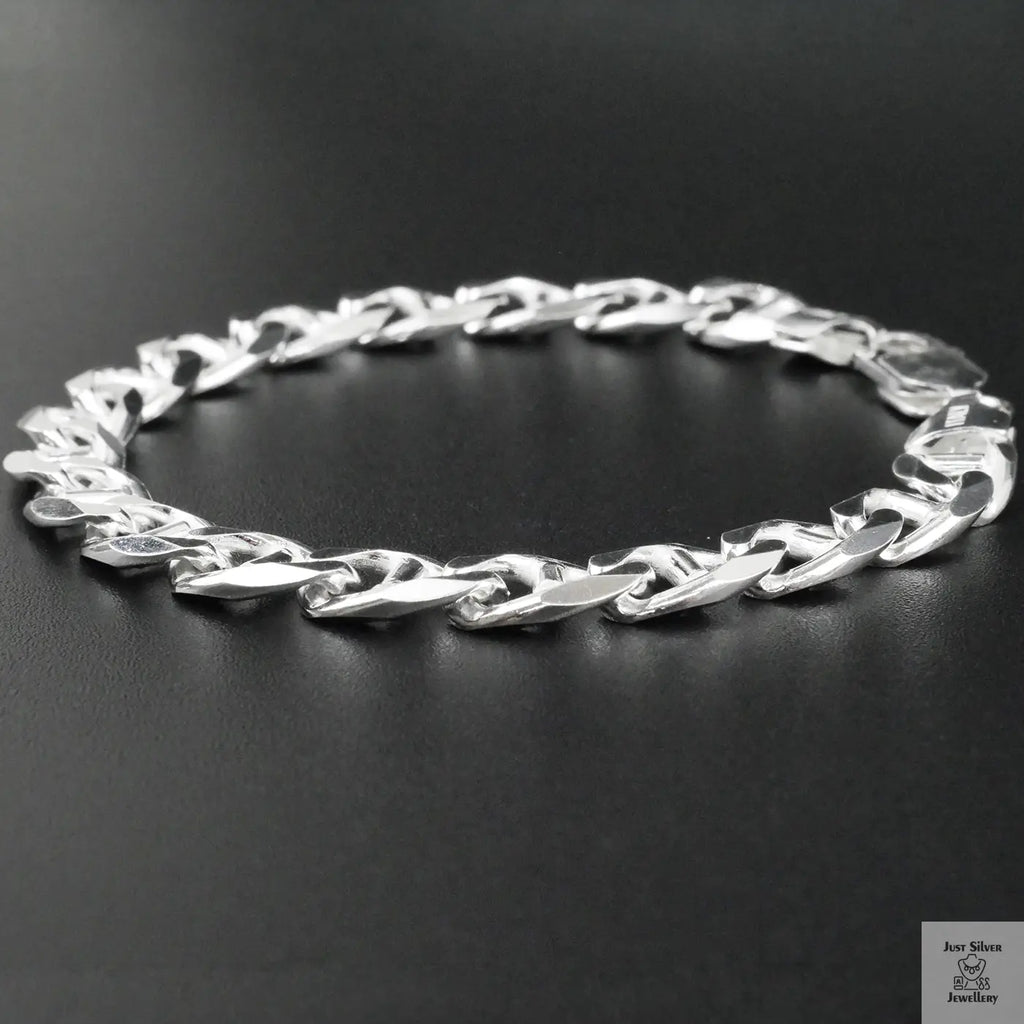 Silver bracelet on a black background