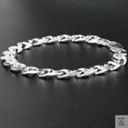 Silver bracelet on a black background