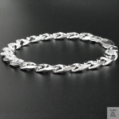 Silver bracelet on a black background