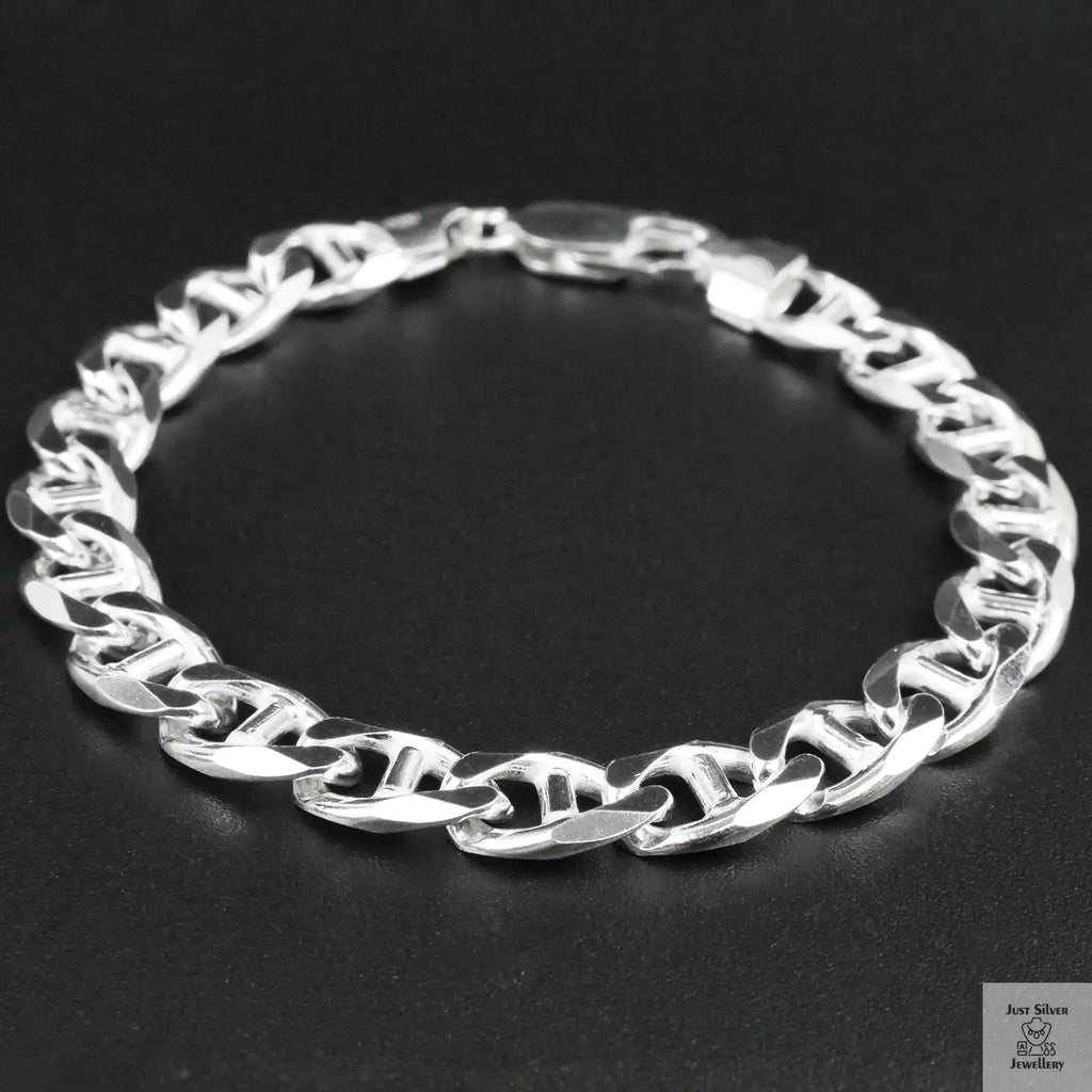 Silver bracelet on a black background