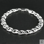 Silver bracelet on a black background