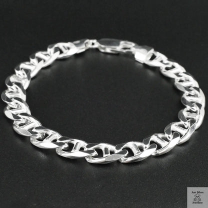 Silver bracelet on a black background
