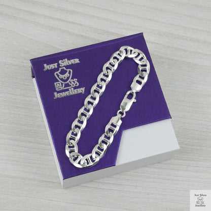 Silver bracelet on a purple card with 'Just Silver Jewellery' branding.