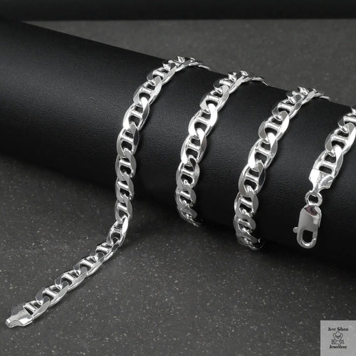 Silver marina chain on a dark surface