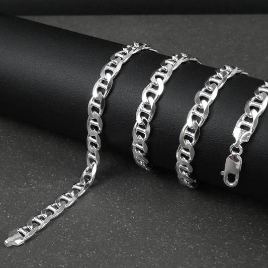 Silver marina chain on a dark surface