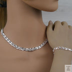 Silver marina necklace and bracelet on a mannequin