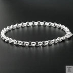 Silver bracelet on a black background