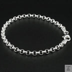 Silver bracelet on a black background