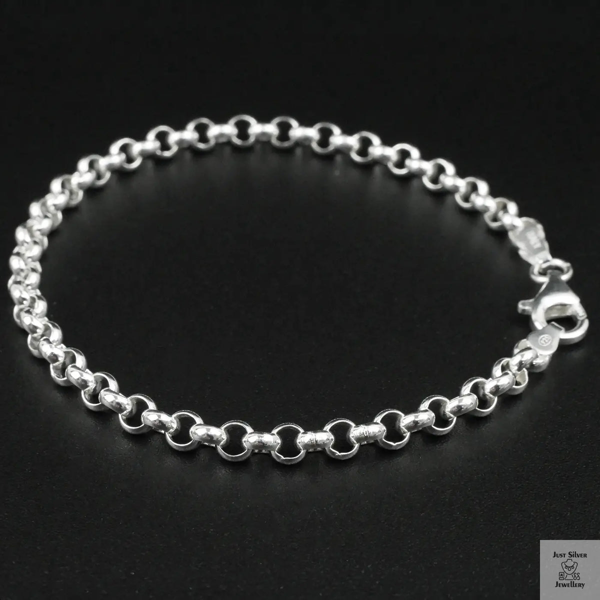 Silver bracelet on a black background