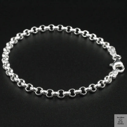 Silver bracelet on a black background