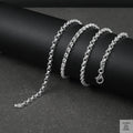 Silver Belcher/Rolo chain bracelet on a dark surface