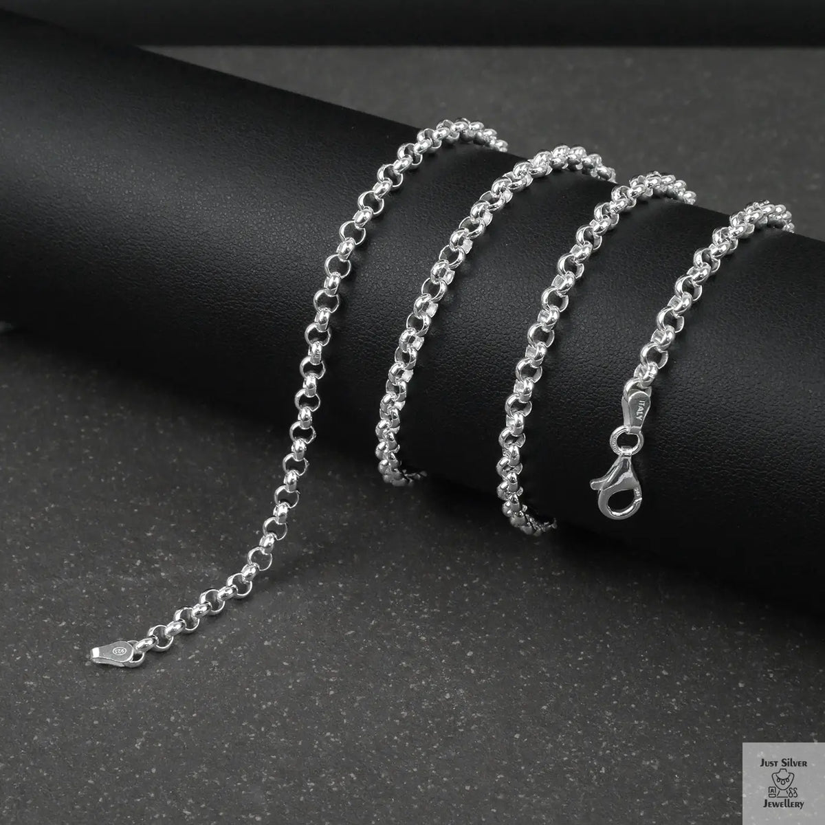Silver Belcher/Rolo chain bracelet on a dark surface