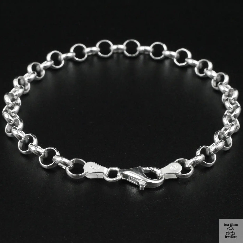 Silver chain bracelet on a black background
