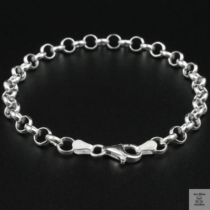 Silver chain bracelet on a black background