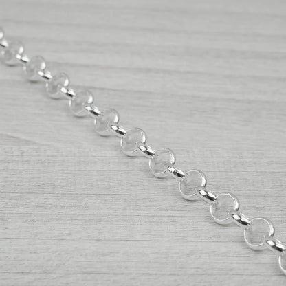 Silver chain on a light grey background