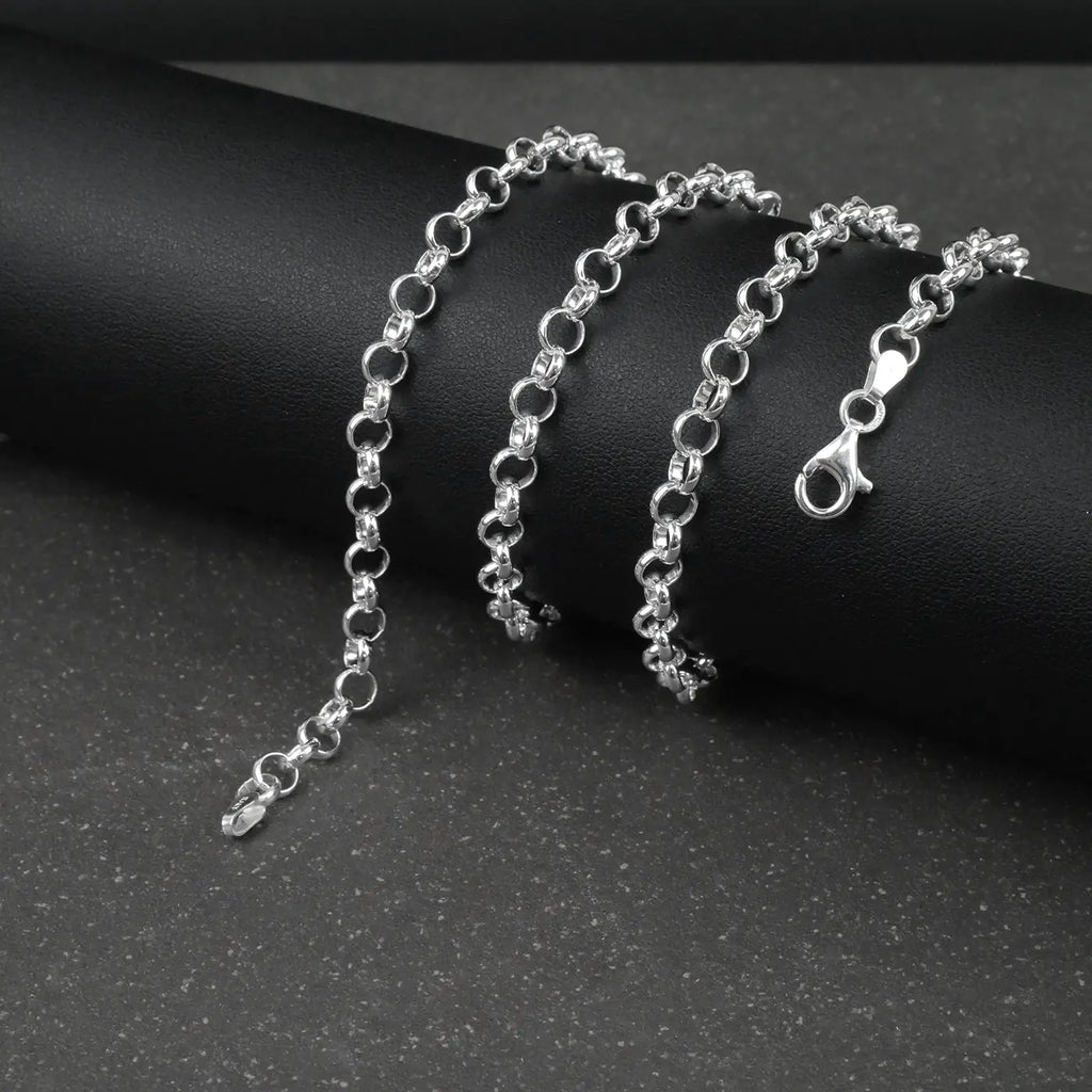 Silver Belcher/Rolo chain bracelet on a dark surface