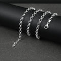 Silver Belcher/Rolo chain bracelet on a dark surface