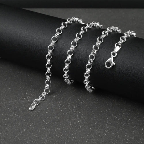 Silver Belcher/Rolo chain bracelet on a dark surface