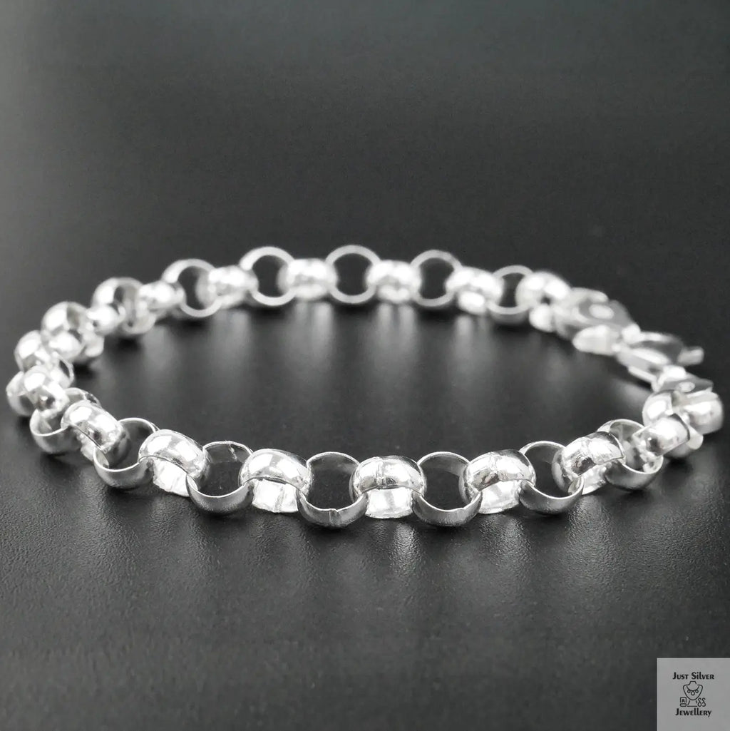 Silver bracelet on a black background