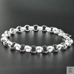 Silver bracelet on a black background