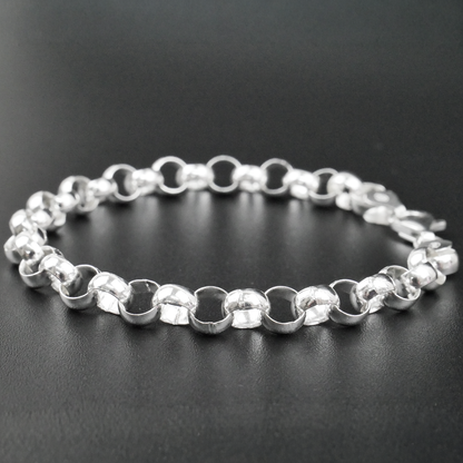 Silver bracelet on a black background