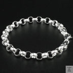 Silver bracelet on a black background