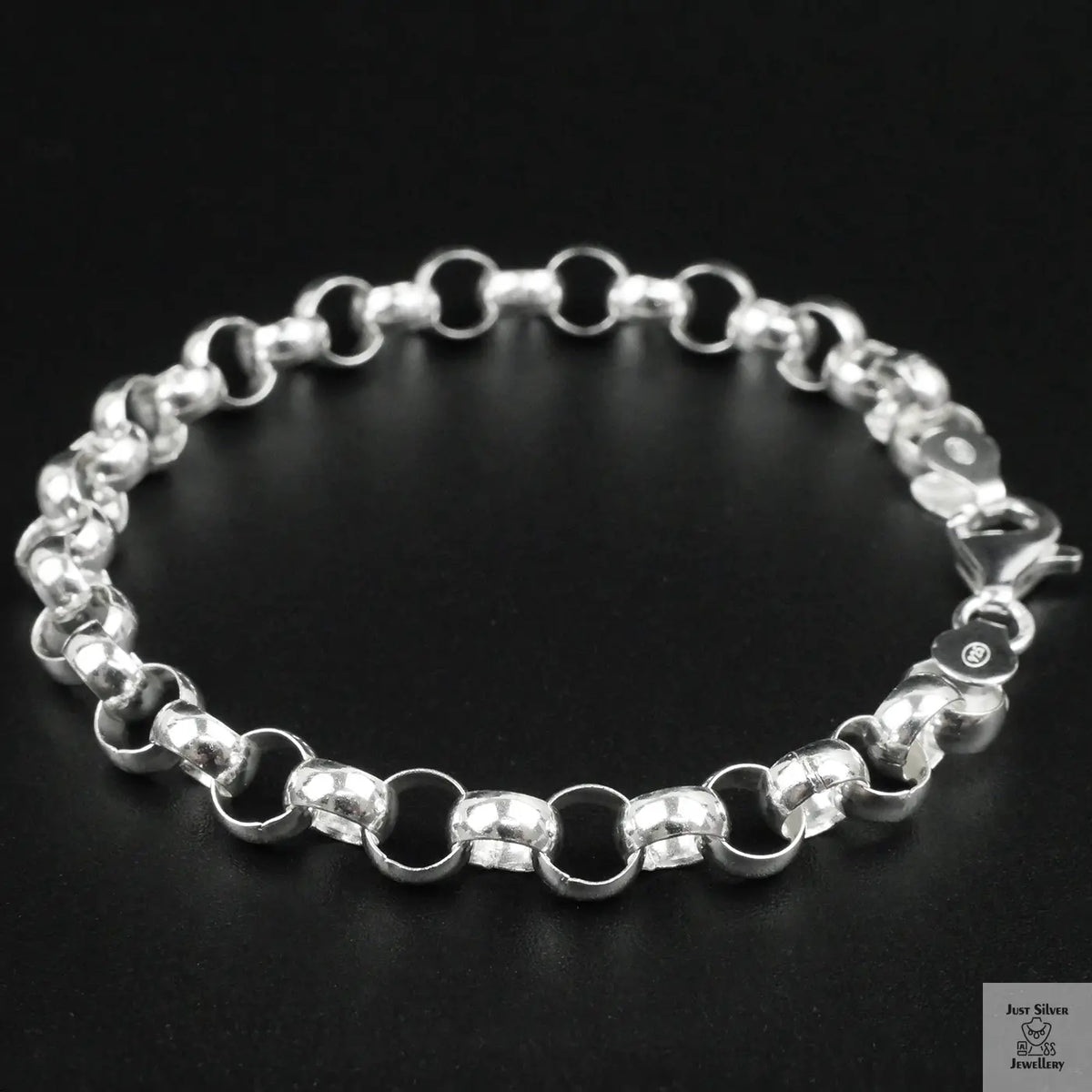 Silver bracelet on a black background