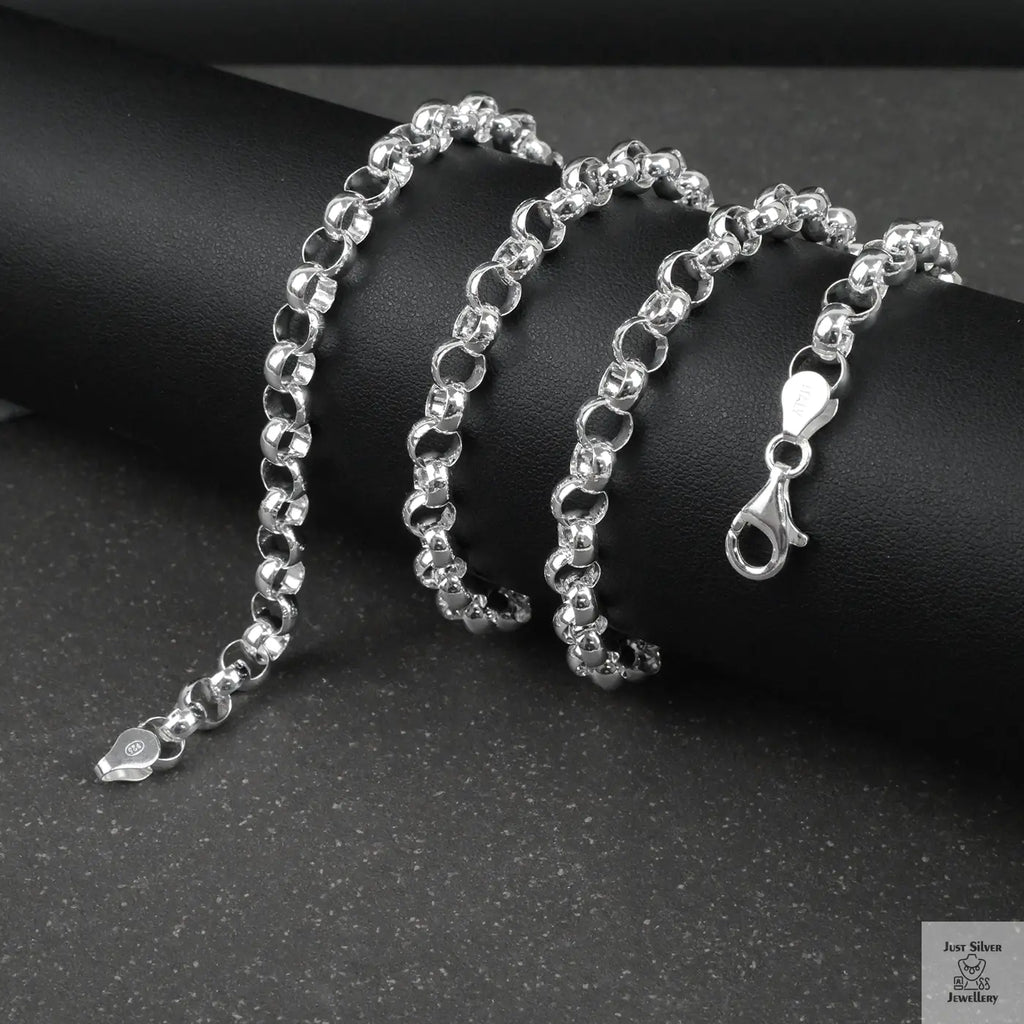 Silver Belcher/Rolo chain necklace on a dark surface