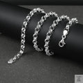 Silver Belcher/Rolo chain necklace on a dark surface