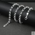 Silver Belcher/Rolo chain necklace on a dark surface