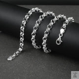 Silver Belcher/Rolo chain necklace on a dark surface