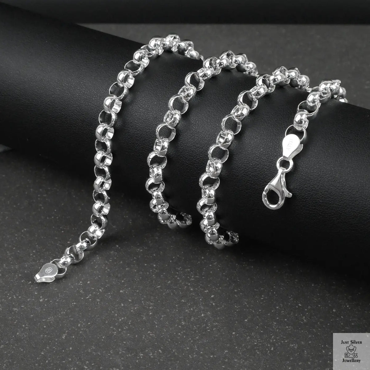 Silver Belcher/Rolo chain necklace on a dark surface