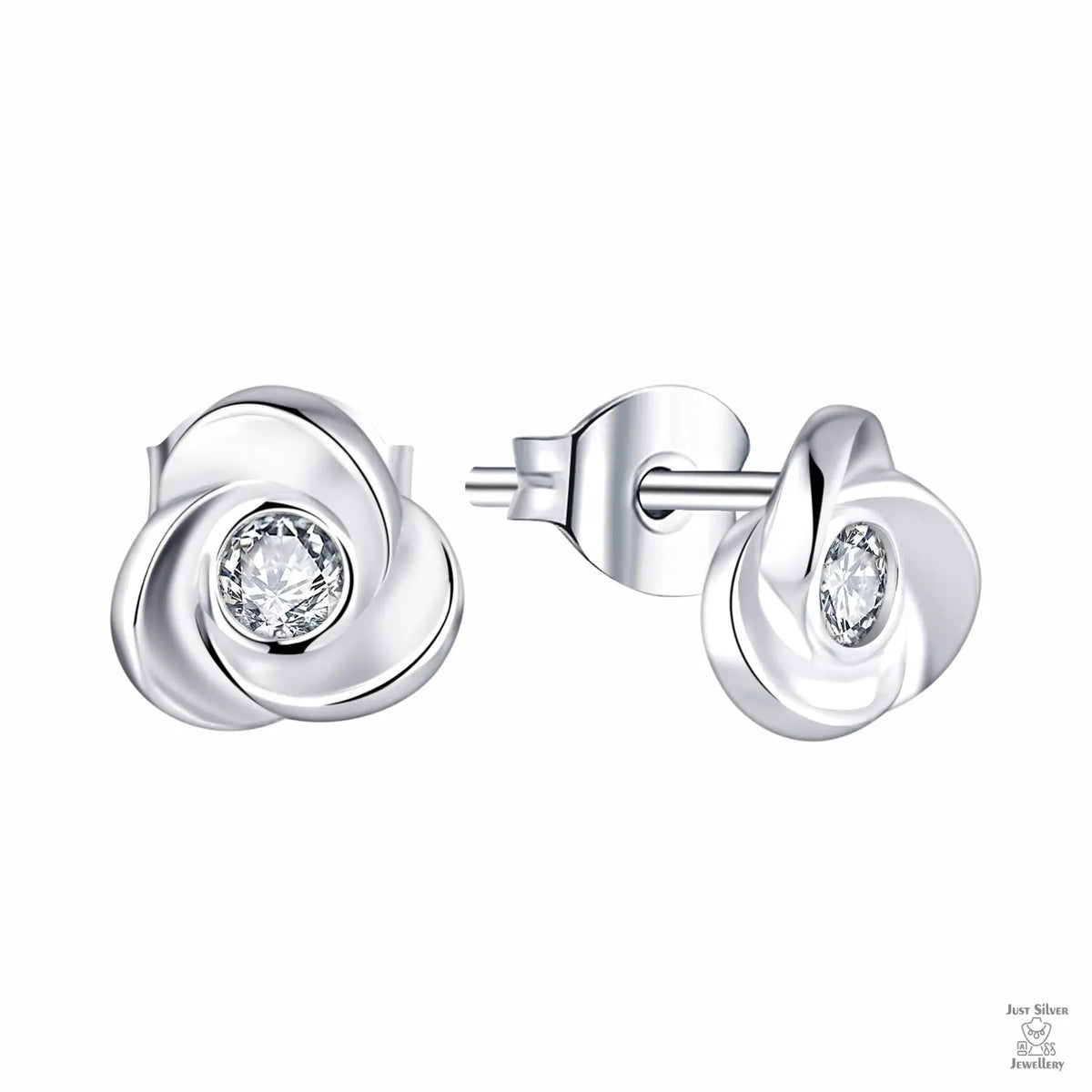 Silver earrings with clear gemstones on a white background