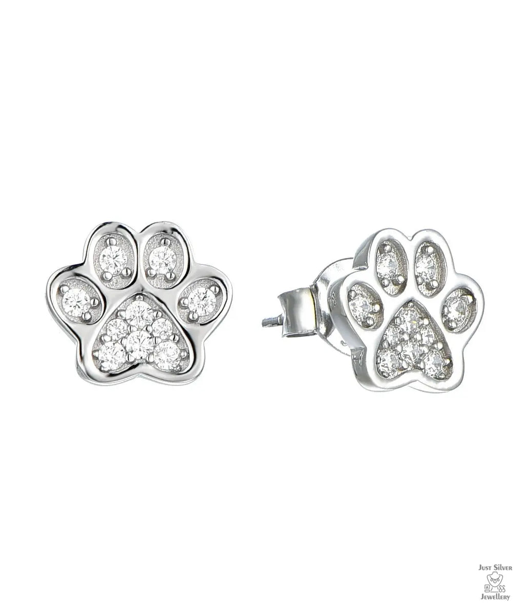 Silver paw print earring with small natural zircon gemstones on a white background