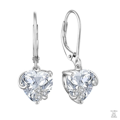 Heart-shaped natural zircon earrings on a white background
