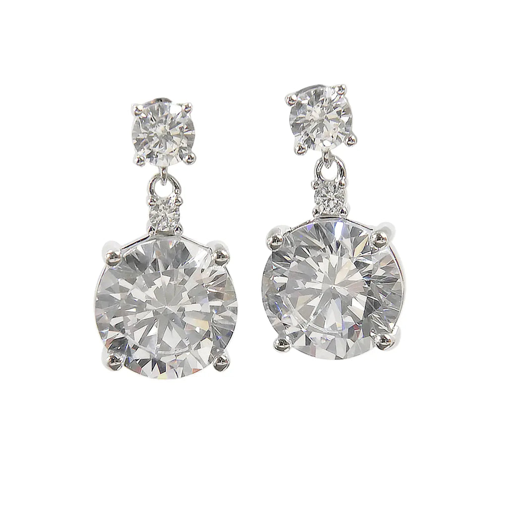 Pair of zircon earrings on a white background