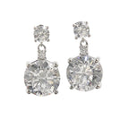 Pair of zircon earrings on a white background