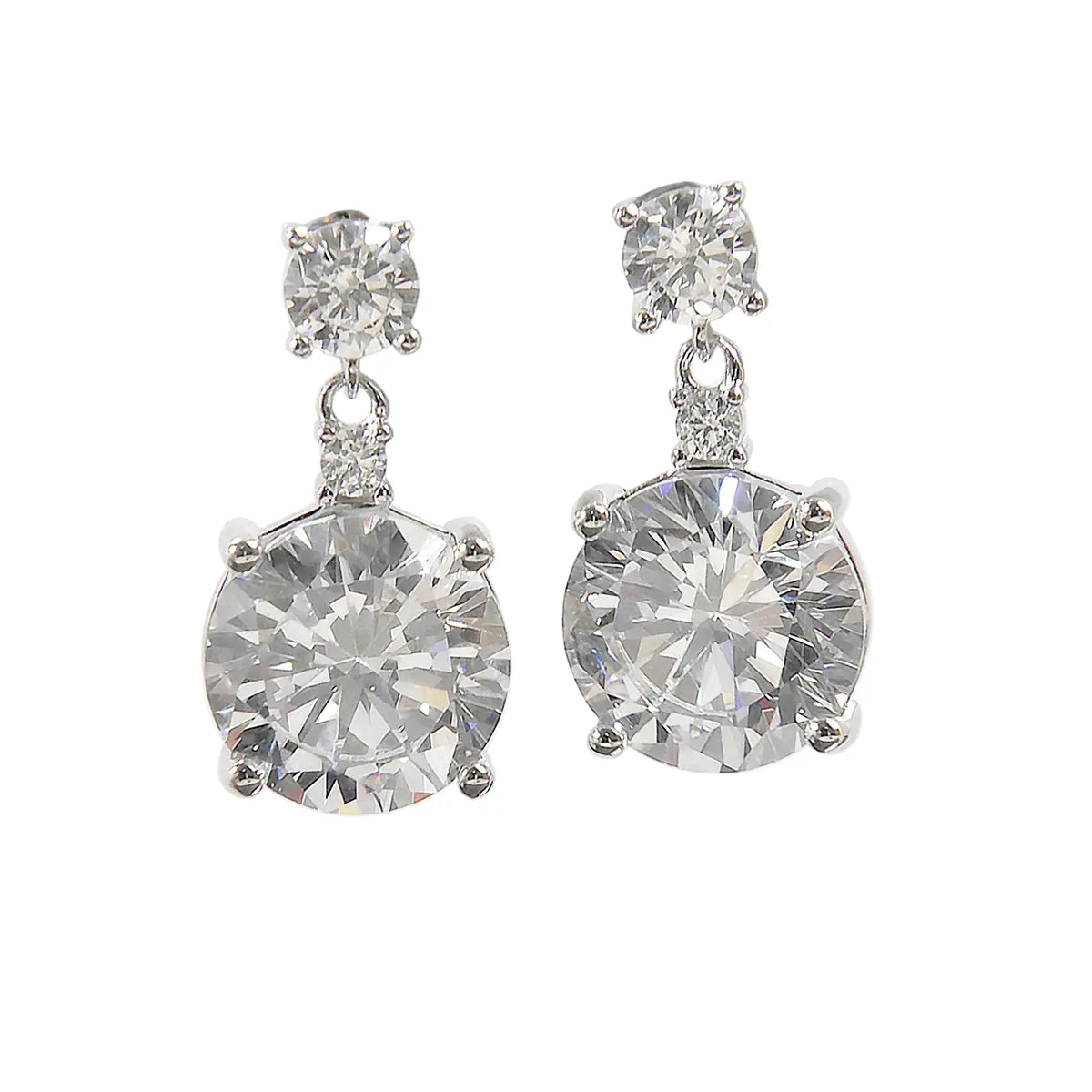 Pair of zircon earrings on a white background